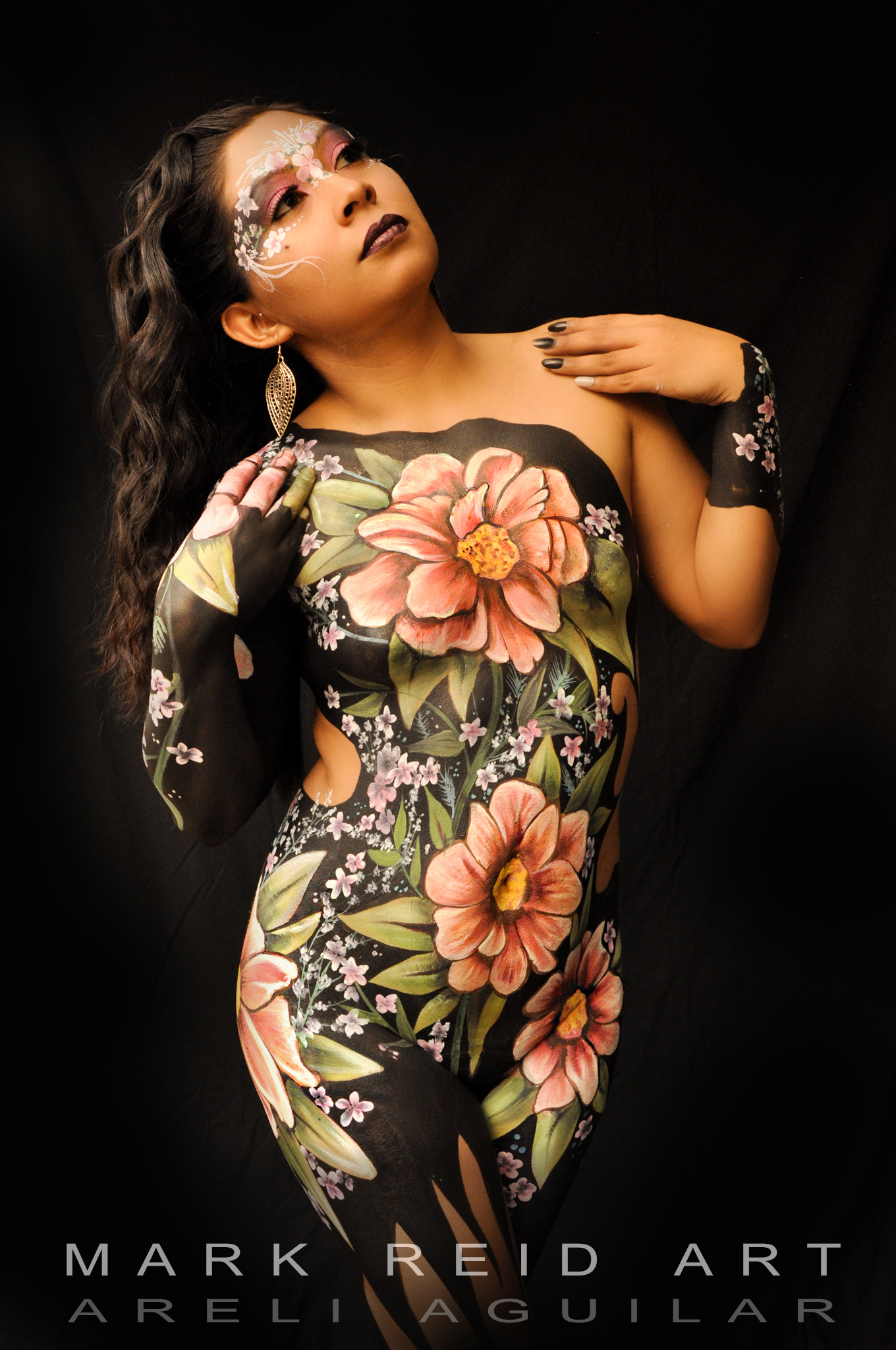 Beautiful Latina in a full body painting featuring light pink roses with a green behind them.